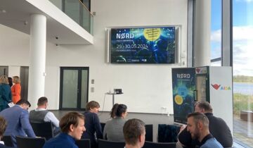 Menschen bei einem Vortrag der Messe NØRD